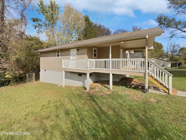 exterior space featuring a yard and a deck