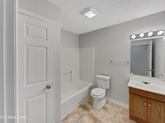 bathroom featuring toilet and vanity