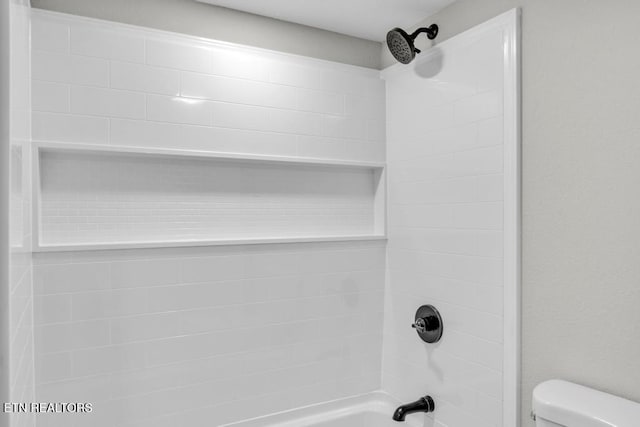 208 Collins St, Loudon, TN 37774 - bathroom with tiled shower / bath and toilet