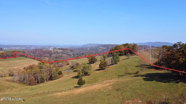 view of mountain feature featuring a rural view