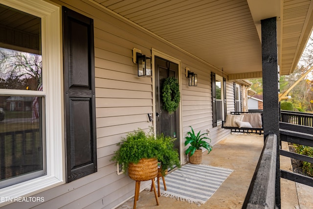 deck featuring covered porch