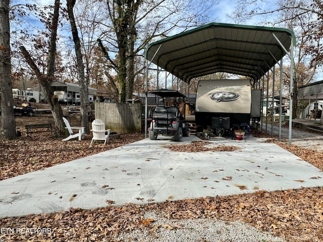 exterior space featuring a carport