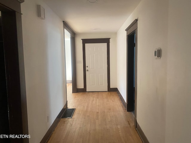 hall featuring light wood-type flooring