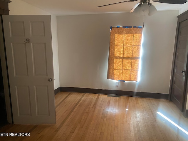 unfurnished bedroom with light hardwood / wood-style floors and ceiling fan