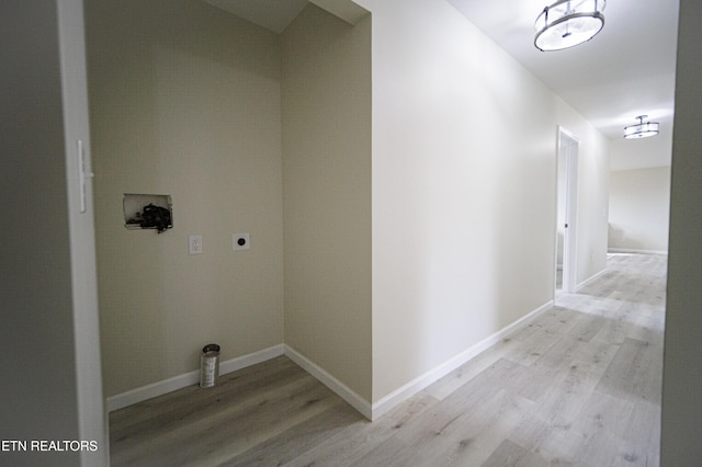 hall with light hardwood / wood-style floors