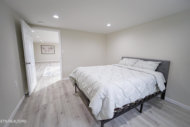 bedroom with light wood-type flooring