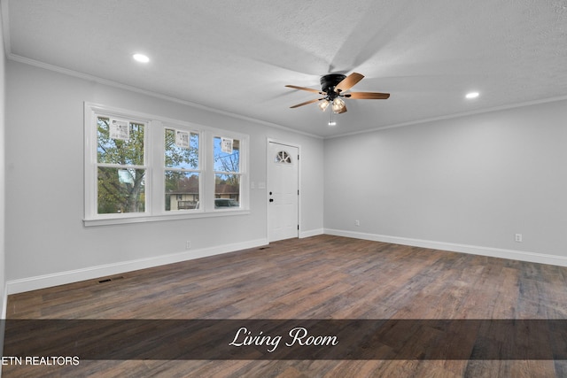 foyer entrance featuring dark hardwood / wood-style flooring, a textured ceiling, and ceiling fan