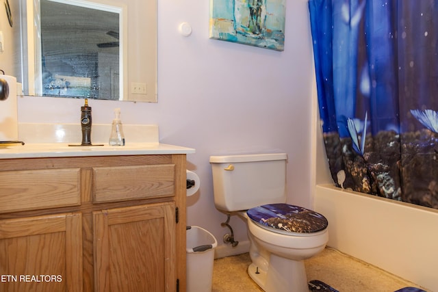 full bathroom with vanity, toilet, and shower / tub combo