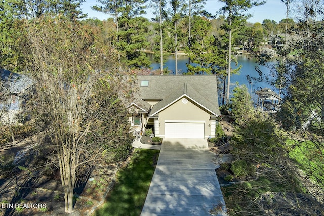 view of front of home with a water view