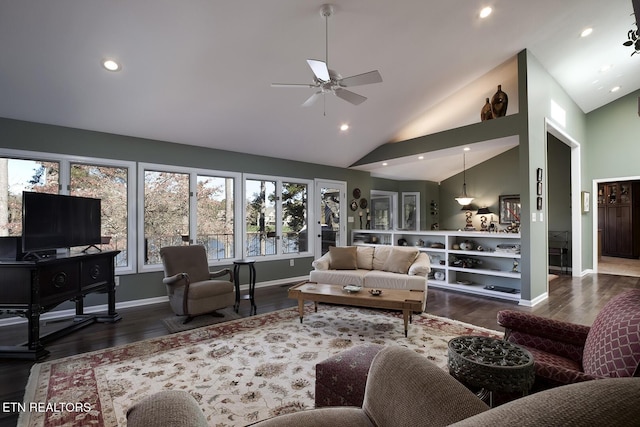 living room featuring ceiling fan, dark hardwood / wood-style floors, and high vaulted ceiling