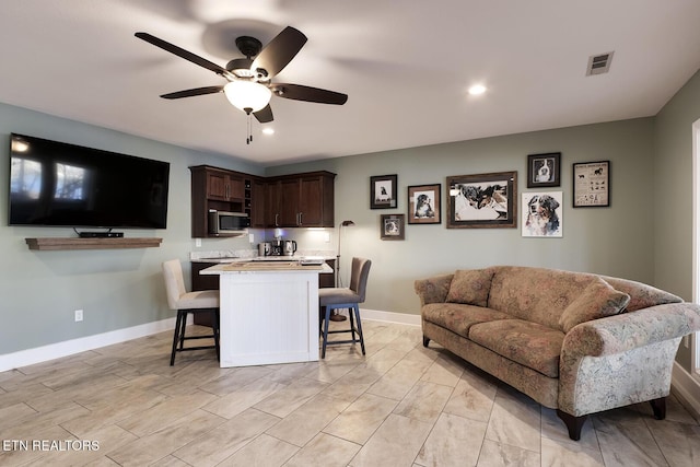 dining area with ceiling fan