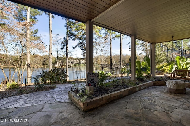 view of patio / terrace with a water view