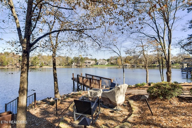 dock area featuring a water view