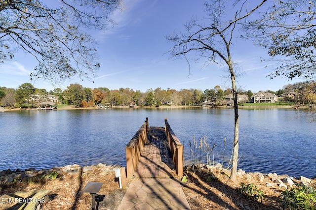 view of dock with a water view