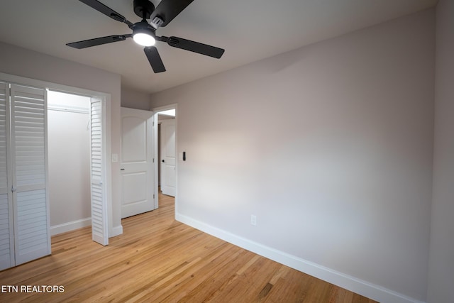 304 Firestone Rd, Oak Ridge, TN 37830 - unfurnished bedroom with baseboards, light wood-type flooring, ceiling fan, and a closet