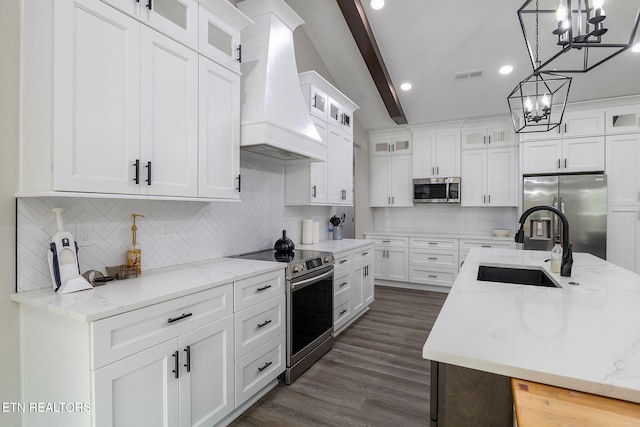 kitchen featuring stainless steel appliances, dark hardwood / wood-style flooring, white cabinets, custom exhaust hood, and beamed ceiling