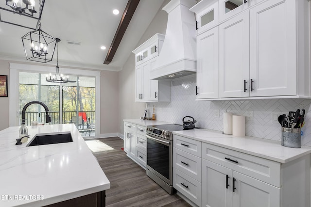 kitchen with white cabinetry, sink, vaulted ceiling with beams, premium range hood, and electric range