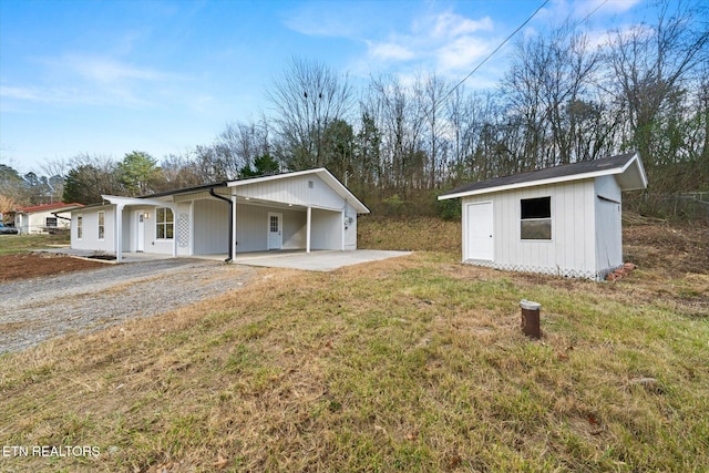 exterior space with a porch and an outdoor structure