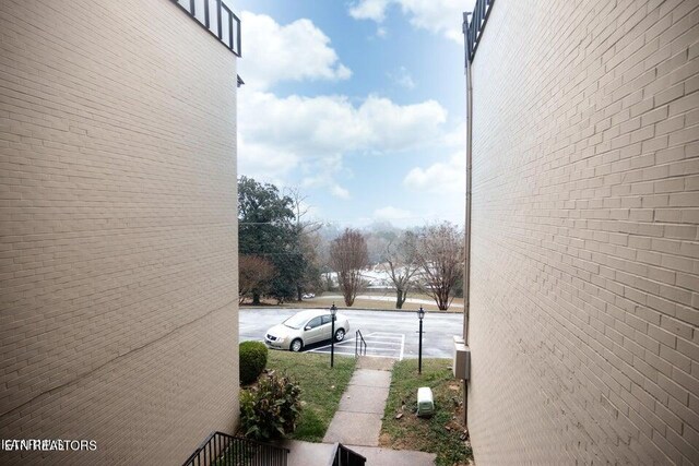 5709 Lyons View Pike Unit 4202, Knoxville, TN 37919 - view of property exterior with brick siding