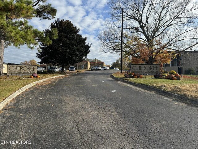 5709 Lyons View Pike Unit 4202, Knoxville, TN 37919 - view of asphalt road with curbs
