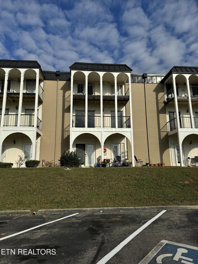5709 Lyons View Pike Unit 4202, Knoxville, TN 37919 - view of apartment building / complex with uncovered parking