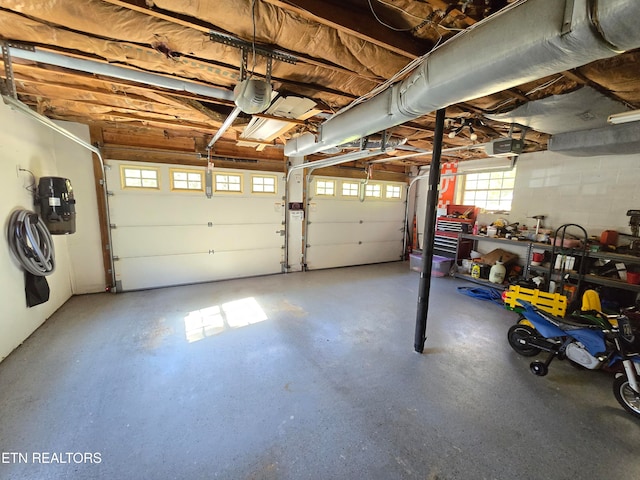 garage featuring a garage door opener