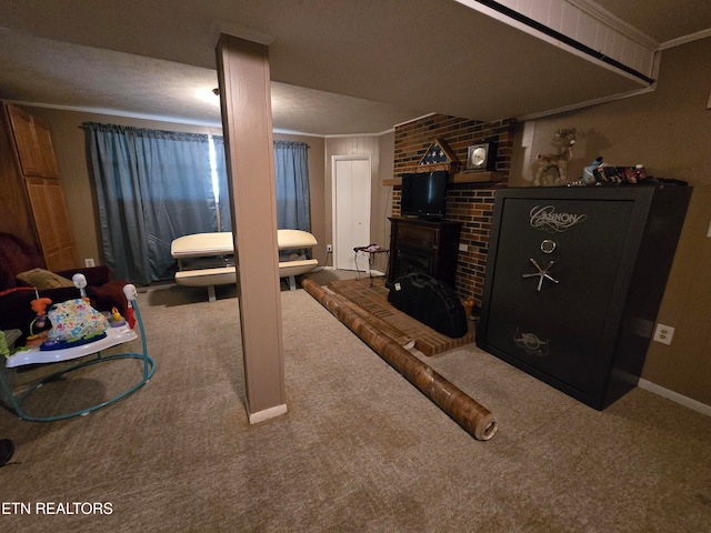 carpeted bedroom with a textured ceiling and crown molding