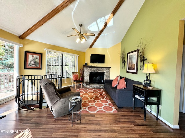 living room with lofted ceiling with skylight, a wealth of natural light, and dark hardwood / wood-style floors