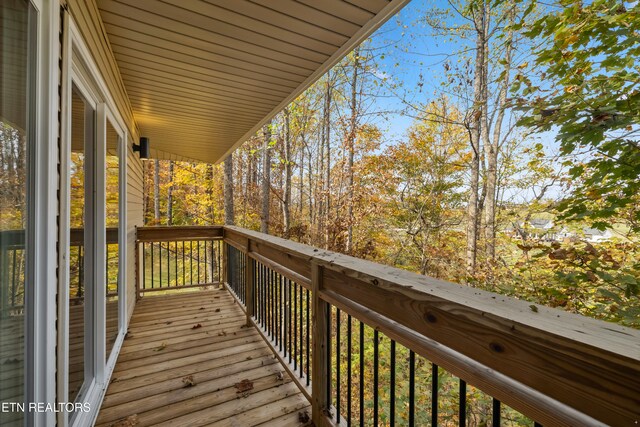 wooden balcony featuring a wooden deck