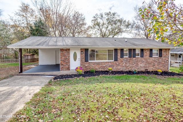 ranch-style home with a front yard and a carport