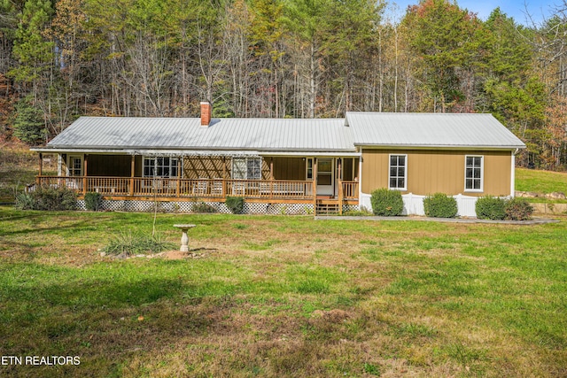 ranch-style house with a front lawn