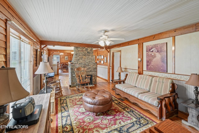 living room with hardwood / wood-style floors and ceiling fan