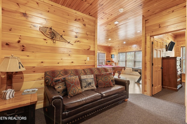 carpeted living room featuring billiards, wooden walls, and wood ceiling