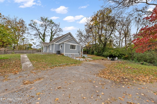 view of side of property featuring cooling unit