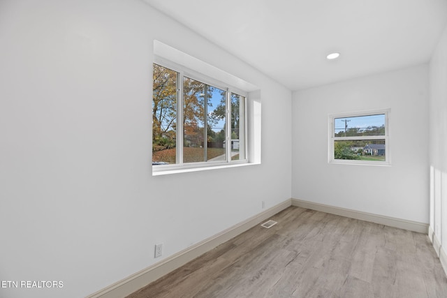 empty room featuring light hardwood / wood-style floors