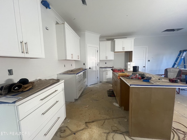 kitchen featuring white cabinets and a kitchen island