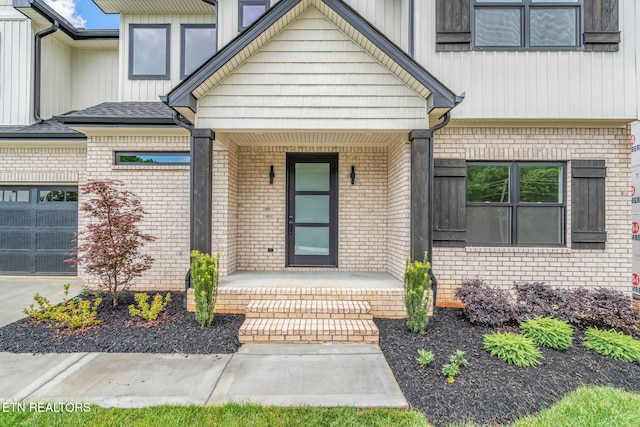 2210 Hickory Crest Ln, Knoxville, TN 37932 - property entrance with covered porch, brick siding, and board and batten siding