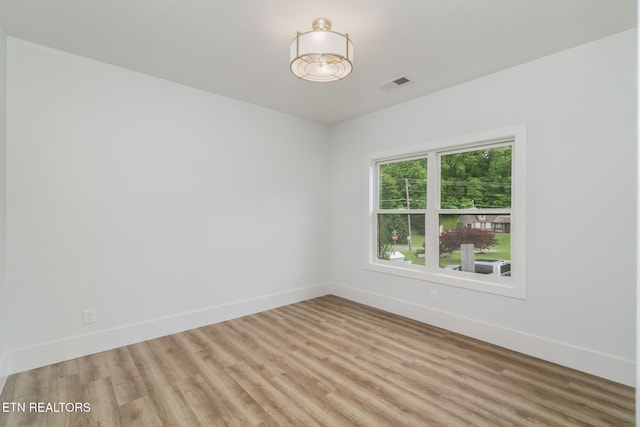 2210 Hickory Crest Ln, Knoxville, TN 37932 - unfurnished room featuring wood finished floors and baseboards
