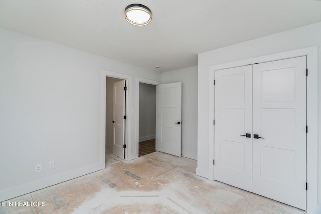 2210 Hickory Crest Ln, Knoxville, TN 37932 - unfurnished bedroom featuring baseboards and a closet