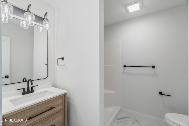 2210 Hickory Crest Ln, Knoxville, TN 37932 - bathroom featuring marble look tile flooring, vanity, a shower, baseboards, and toilet