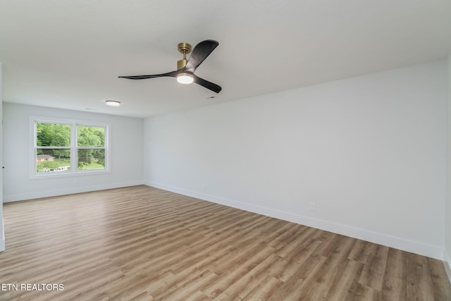 2210 Hickory Crest Ln, Knoxville, TN 37932 - empty room with light wood-style flooring, baseboards, and ceiling fan