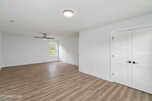 2210 Hickory Crest Ln, Knoxville, TN 37932 - empty room featuring a ceiling fan, light wood-type flooring, and baseboards