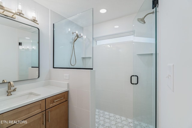 2210 Hickory Crest Ln, Knoxville, TN 37932 - bathroom featuring tiled shower and vanity