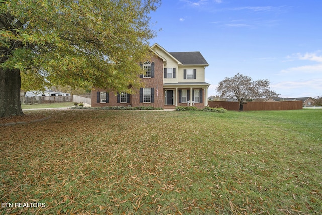 view of front of home with a front lawn