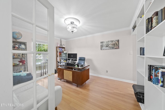 office featuring wood-type flooring, an inviting chandelier, and crown molding