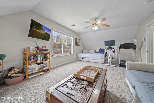 carpeted living room featuring ceiling fan and vaulted ceiling