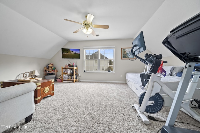 workout room featuring carpet, vaulted ceiling, and ceiling fan