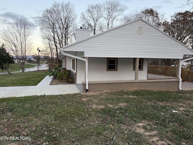 1184 Davis Chapel Rd, Lafollette, TN 37766 - view of side of home with a chimney and covered porch
