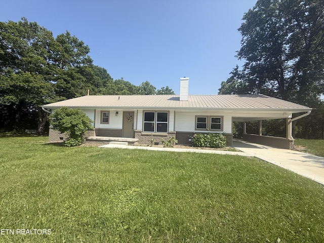 1184 Davis Chapel Rd, Lafollette, TN 37766 - ranch-style house with a chimney, a front yard, driveway, a carport, and metal roof