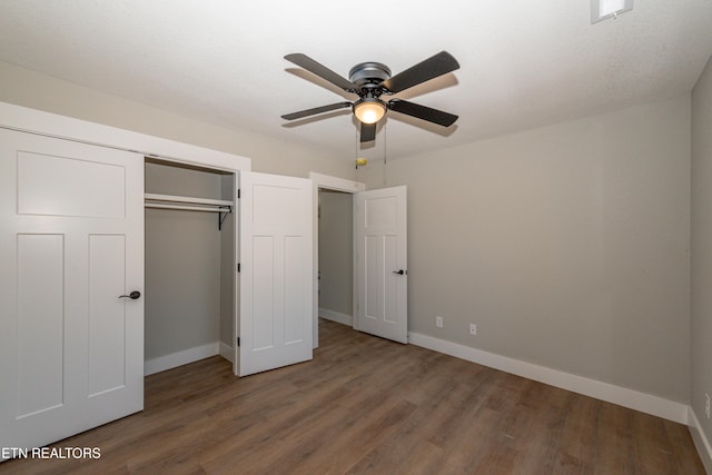 6105 Lanier Rd, Maryville, TN 37801 - unfurnished bedroom with wood finished floors, baseboards, a closet, and ceiling fan